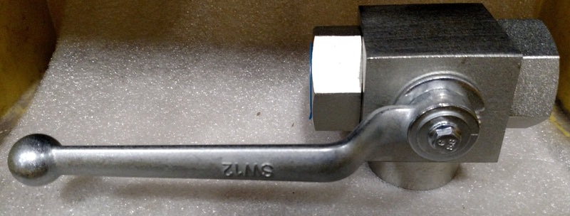 Metal wrench on a gray surface