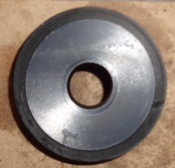 Metallic washer on a textured surface